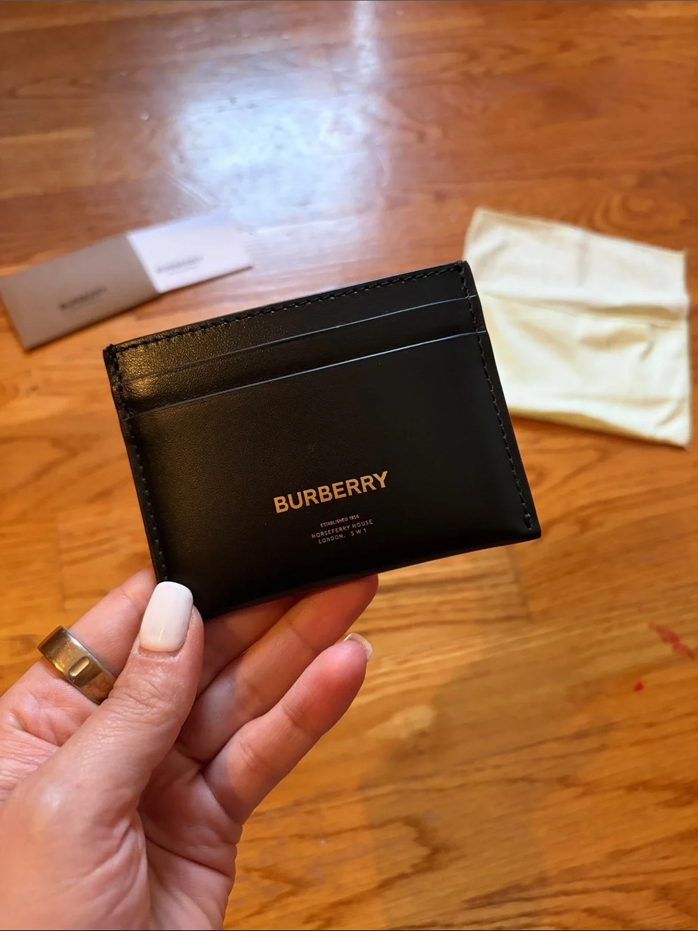 Never used! Brand New! Burberry Black Leather Card & Key Sleeve with Gold Logo